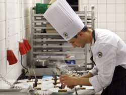 Foto Koch bei der Arbeit